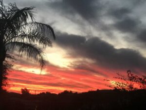 Nature-inspired Klarity with picturesque sunset and cloud-streaked sky