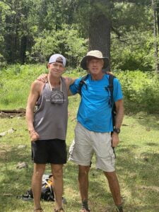 Motivational coach, Matt Miller, outdoors with close friend
